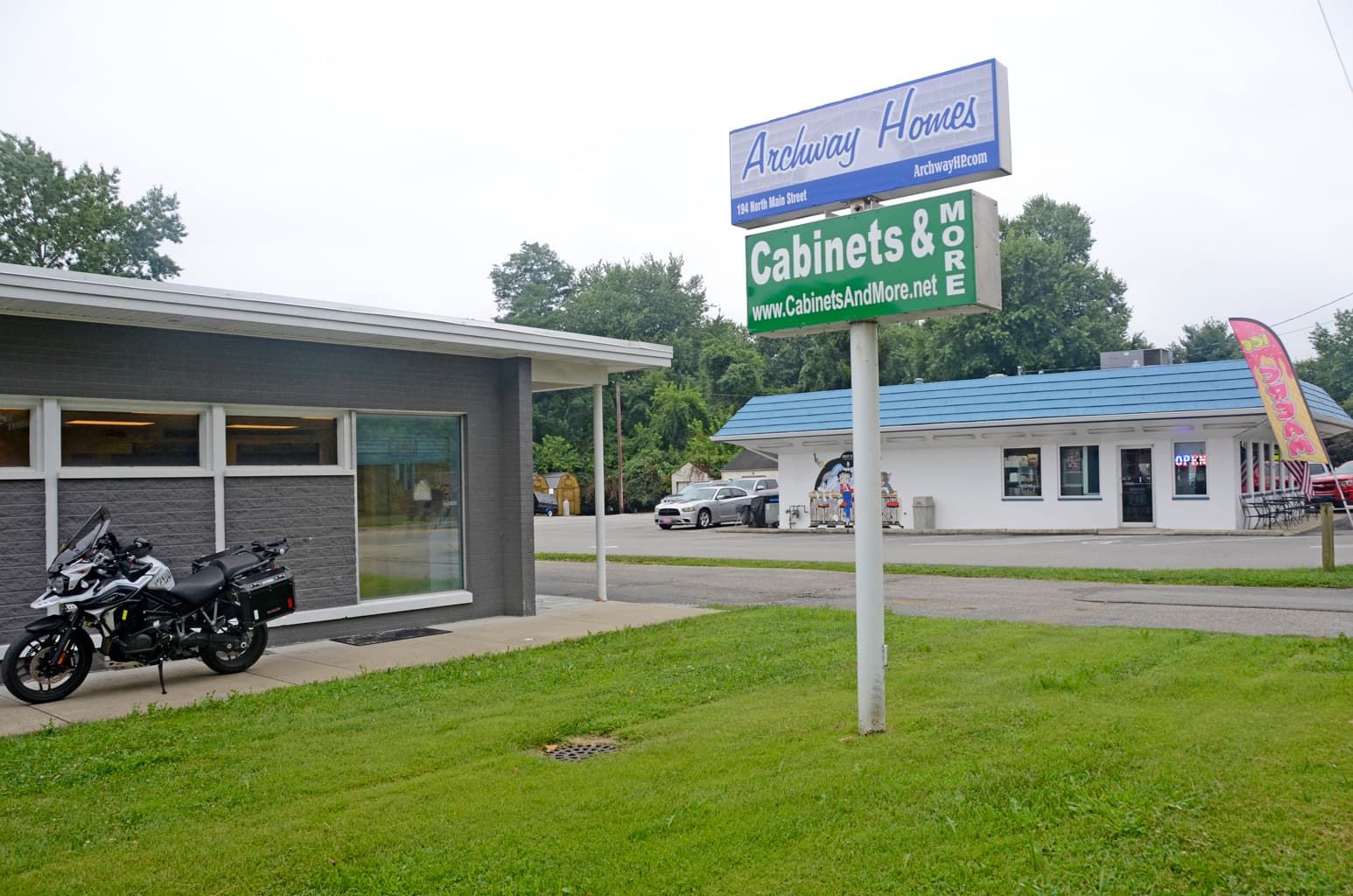 The Cabinets & More sign on North Main Street in Walton, Kentucky, in front of the showroom.